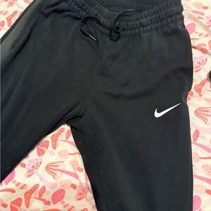 Nike Black Jogger Sweatpants with White Swoosh -